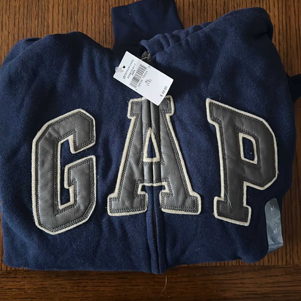 New with tags lined zip up.